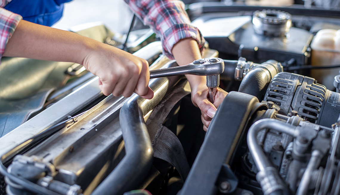 a vehicle engine being worked on