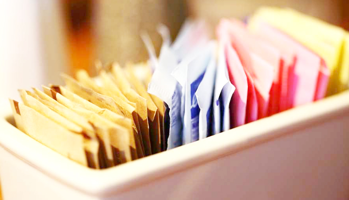 closeup of ubiquitous restaurant table dish of artificial sweeteners
