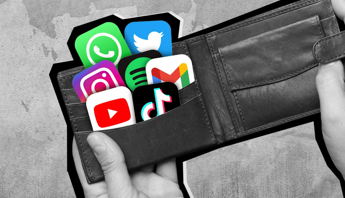 hands opening a wallet that contains mobile apps